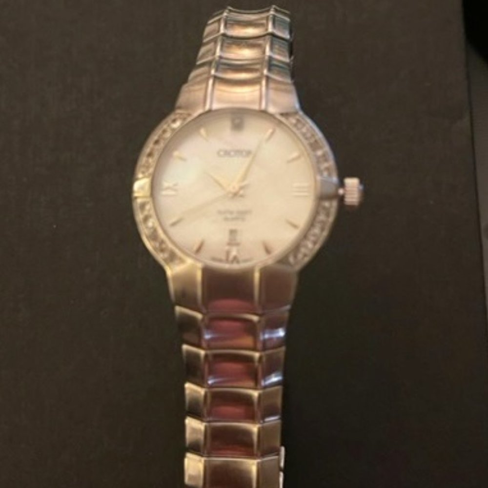 Silvertone, Swiss Quartz Croton Silver; MOP facing' white topaz women's watch